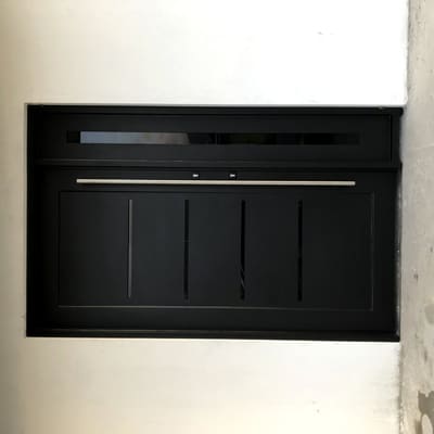 Black door with sidelight. Entry Doors by Nair Smart Solutions