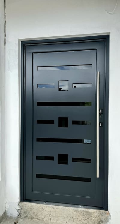 Slot and square pattern. Entry Doors by Nair Smart Solutions