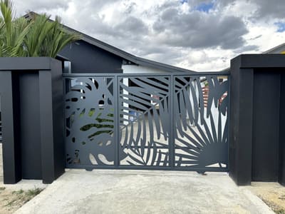 Palm and monstera. Driveway Gates by Nair Smart Solutions