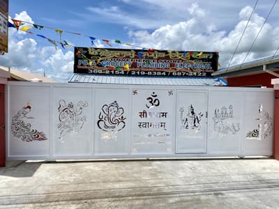 Seven deities and Om. Driveway Gates by Nair Smart Solutions