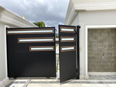 Copper-framed glazing. Driveway Gates by Nair Smart Solutions