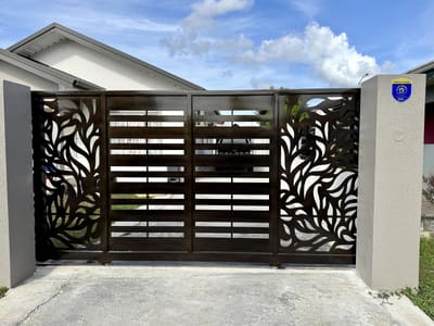 Leaf panels in bronze. Driveway Gates by Nair Smart Solutions